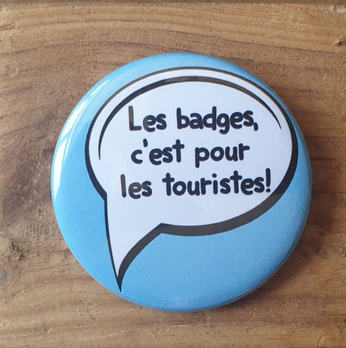 Badge c'est pour les touristes